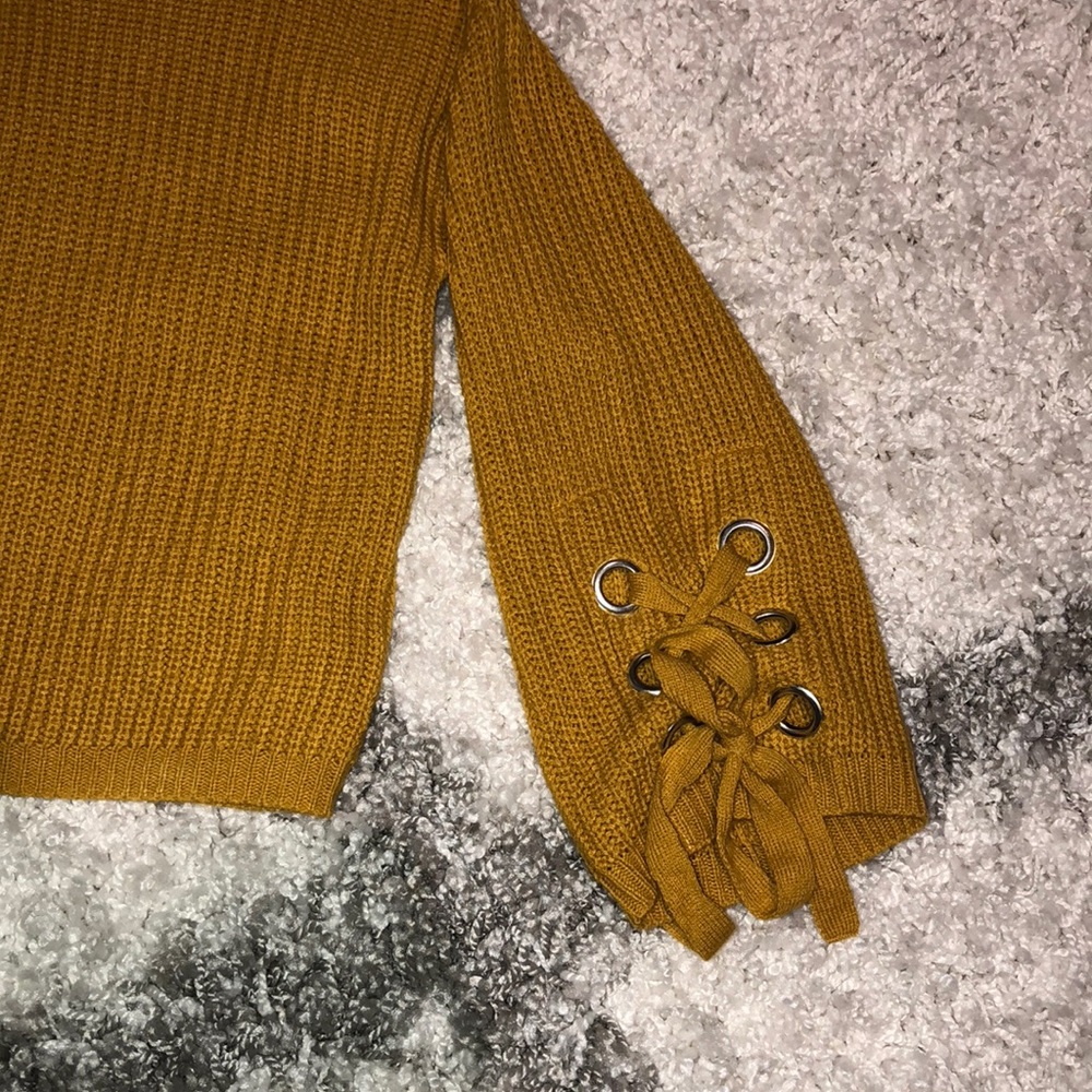 sweater with sleeve detailing